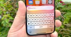 type to siri interface on an iPhone 15 Pro screen